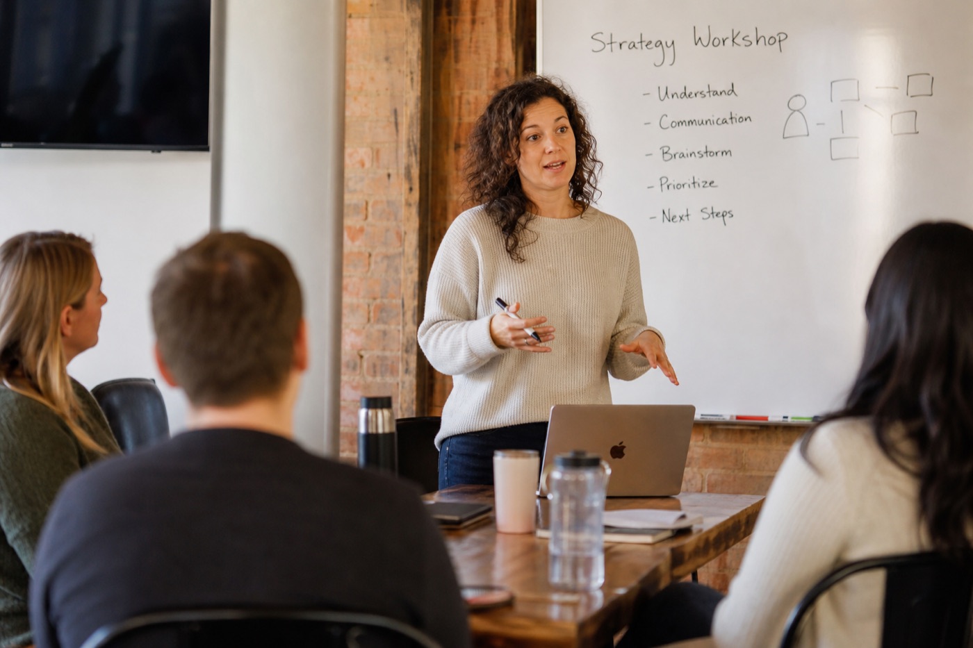 Coach teaching a workshop group