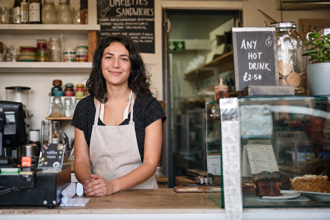 Local shop owner at the counter